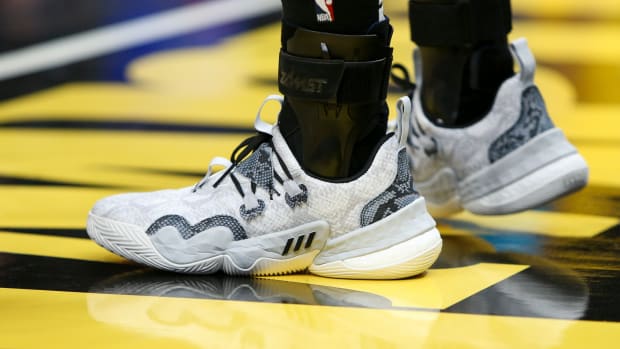 Atlanta Hawks guard Trae Young wears the Adidas Trae Young 1 'Snakeskin' sneakers against the Charlotte Hornets on December 5, 2021.